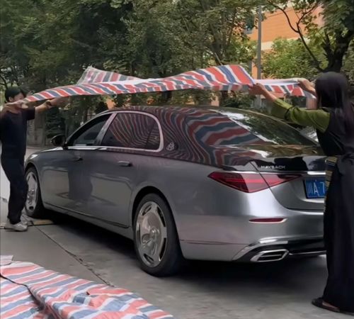 汽车雨布大概多少斤